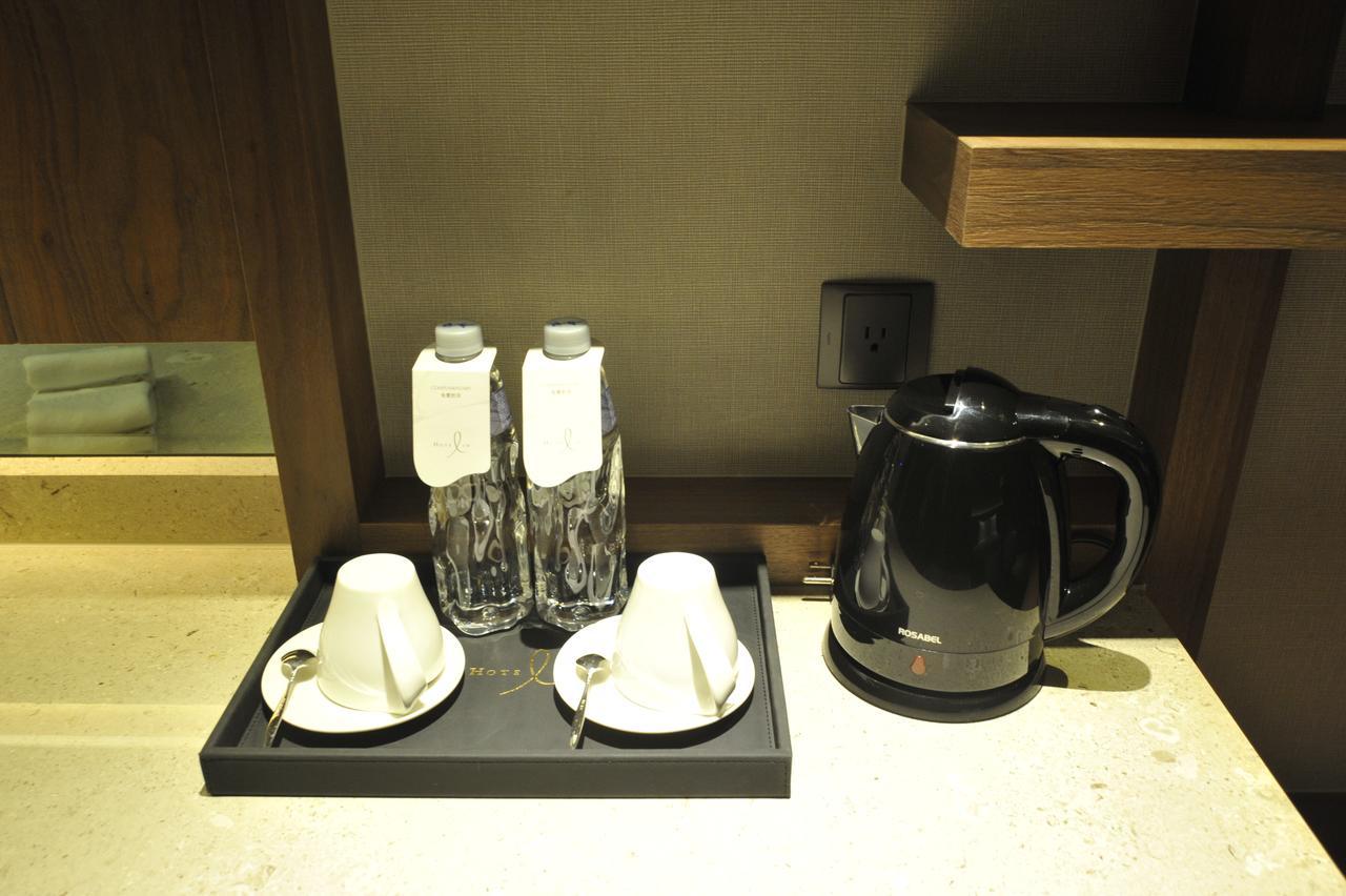 Hotel In Pingzhen Bagian luar foto