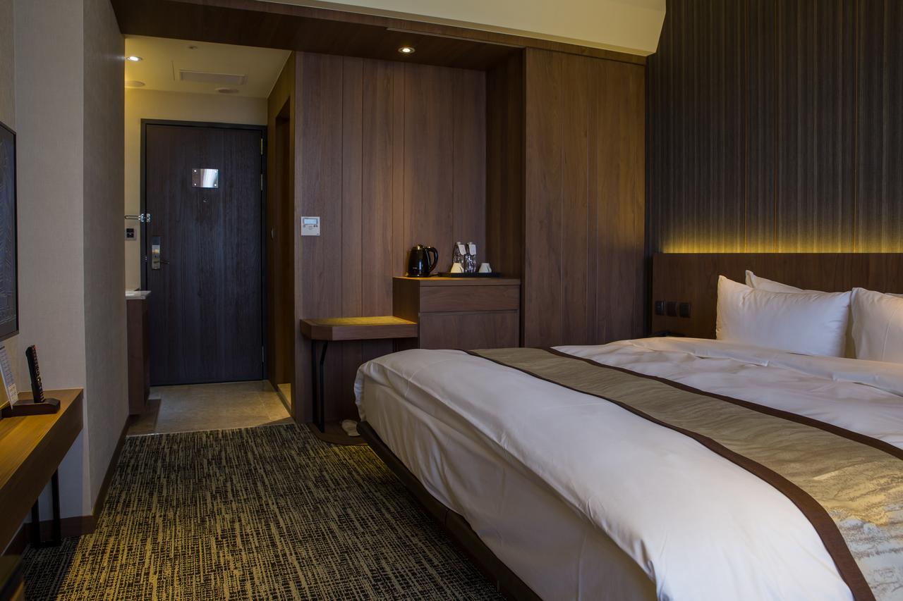 Hotel In Pingzhen Bagian luar foto