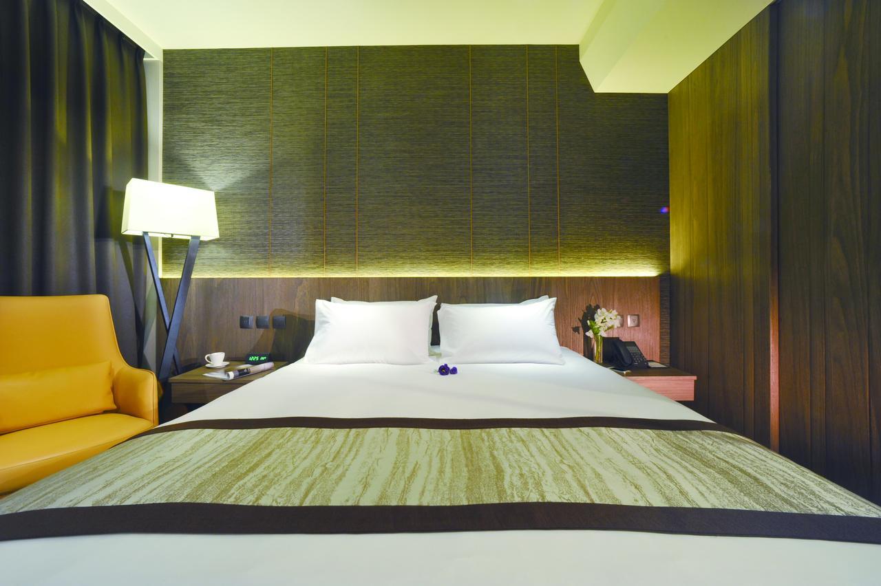 Hotel In Pingzhen Bagian luar foto